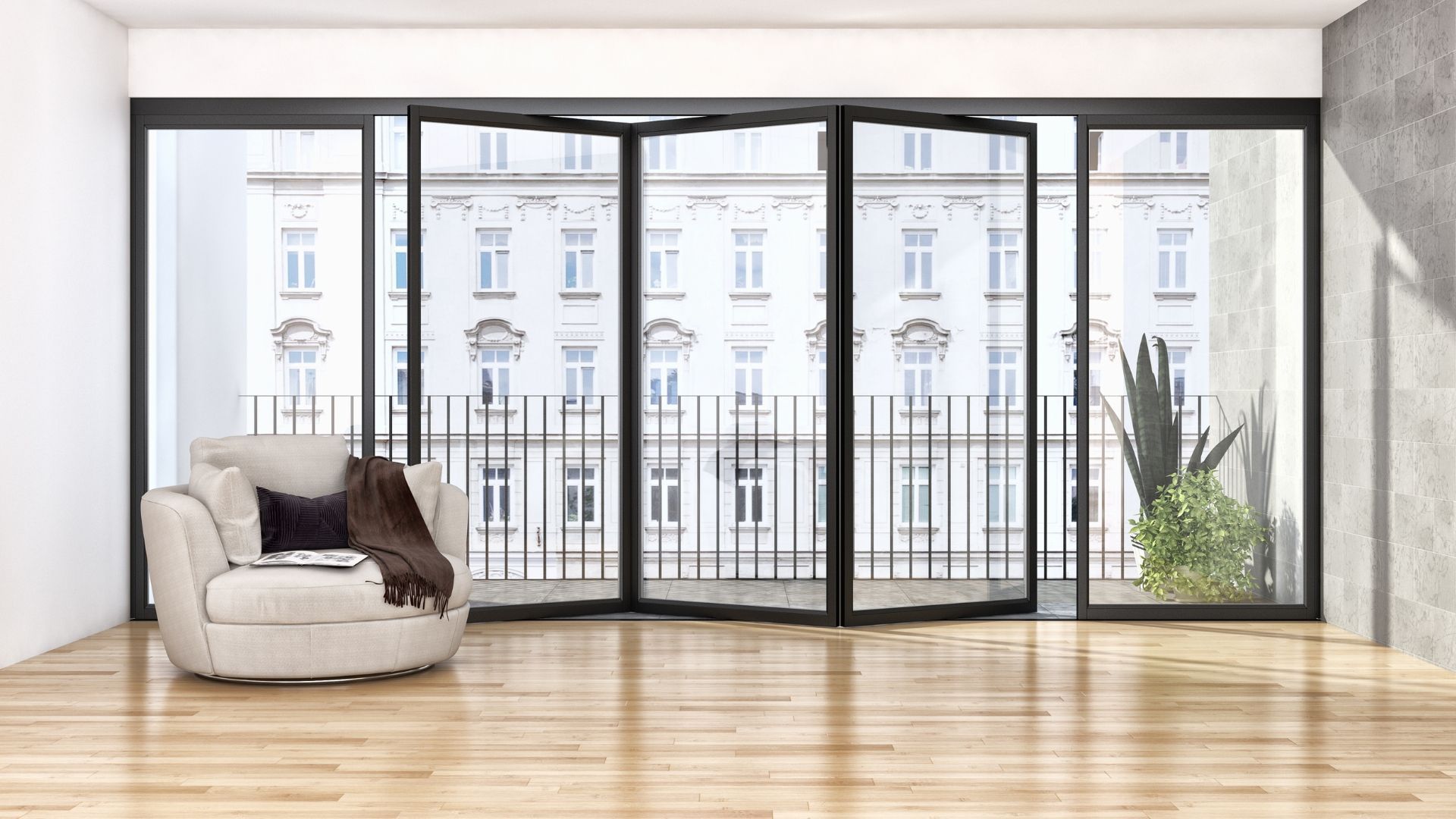Modern living room with a beige sofa, wooden floor, and large windows overlooking city buildings