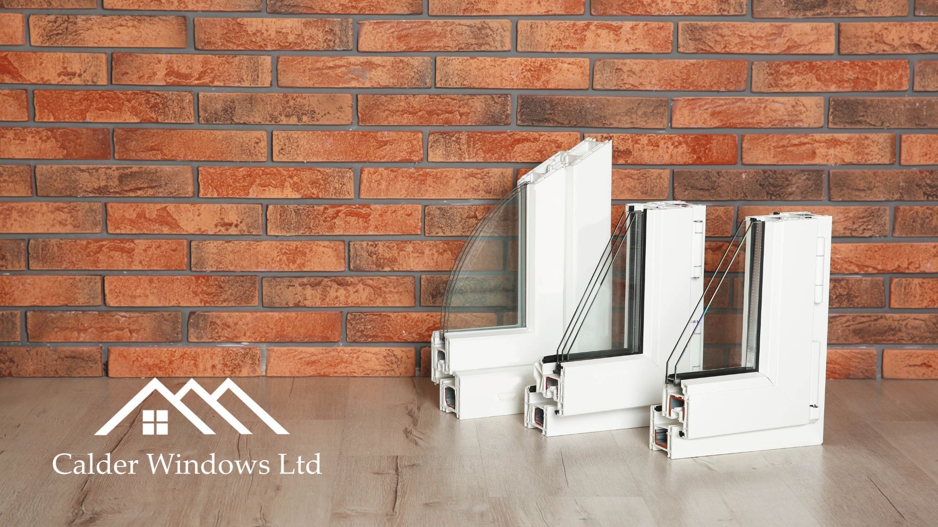 Three white folding window grilles displayed against a brick wall on a concrete floor