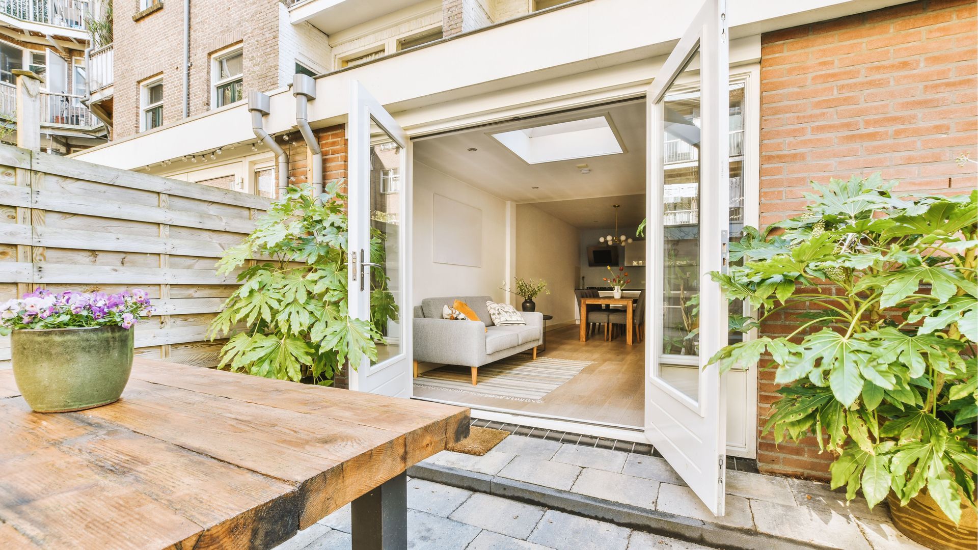 Do you have a small garden? You may be wondering whether to go for sliding doors or French doors.