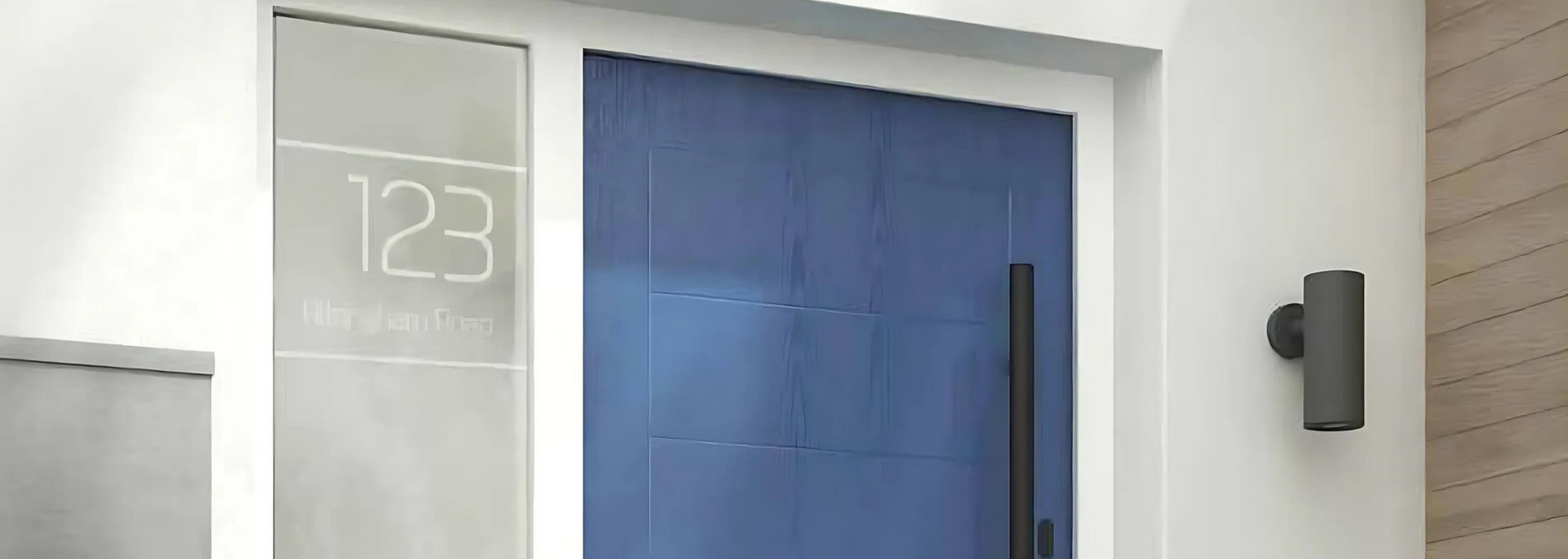 Blue front door with house number 123 and a wall-mounted light beside it