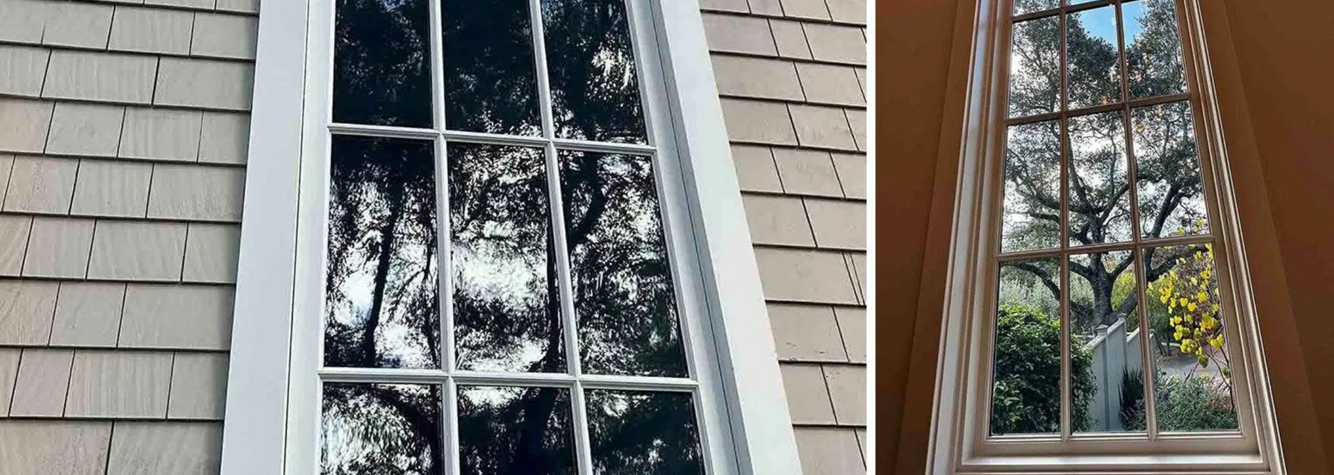 Side-by-side windows in a beige house exterior, reflecting trees outside
