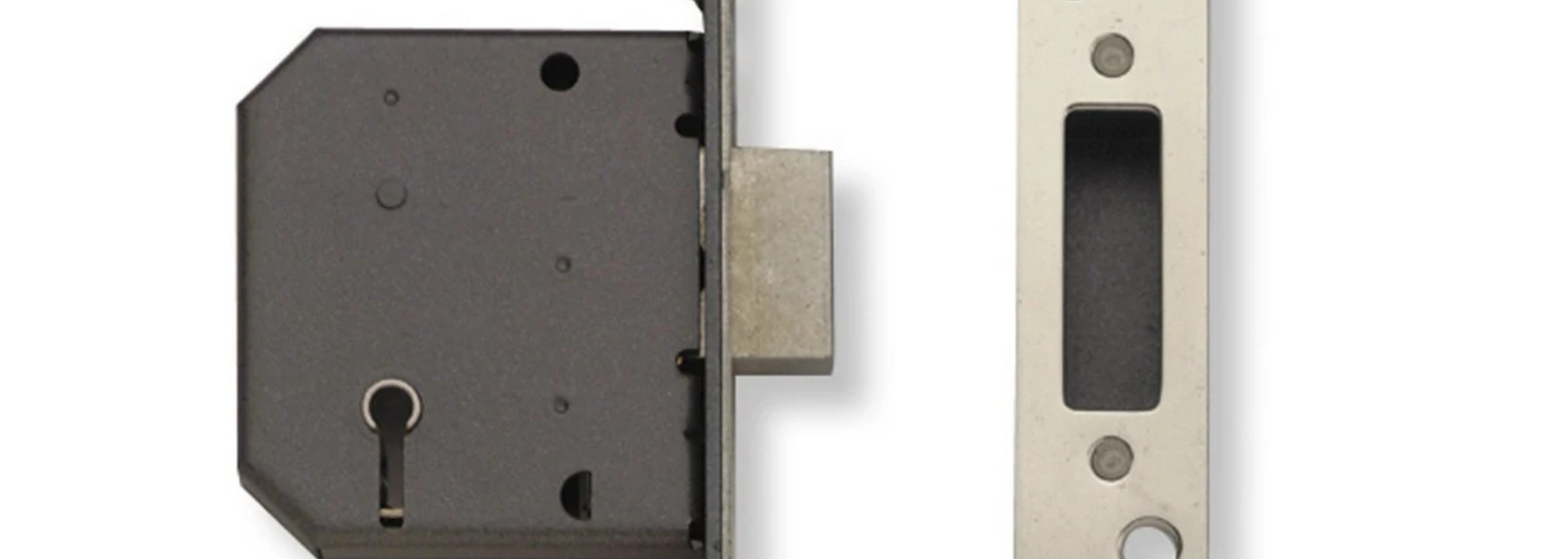 Dark gray door lock with keyhole beside a silver strike plate and latch opening.