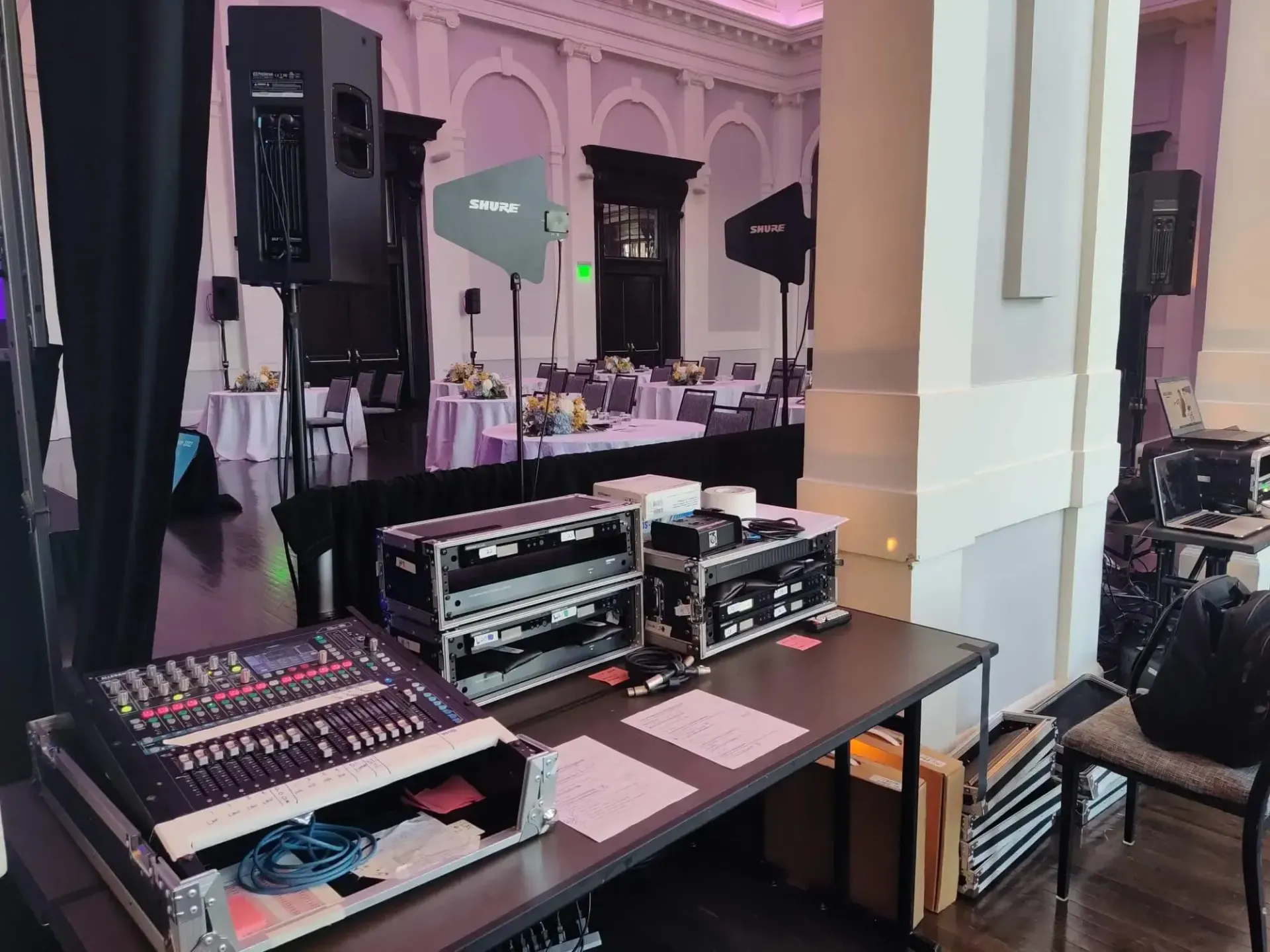 A room with a table and a bunch of equipment on it.