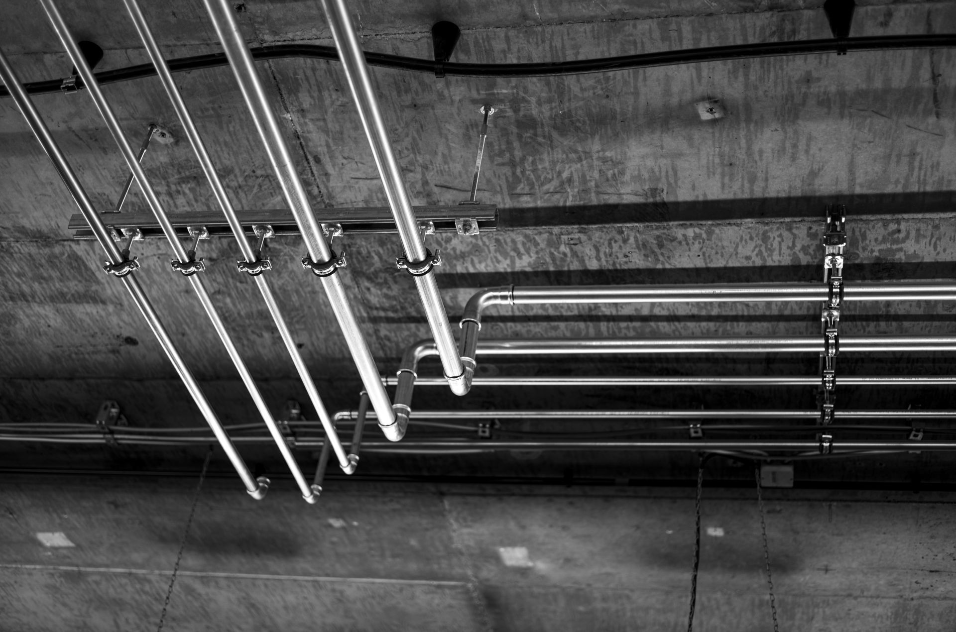 image of some plumbing pipes on the ceiling 