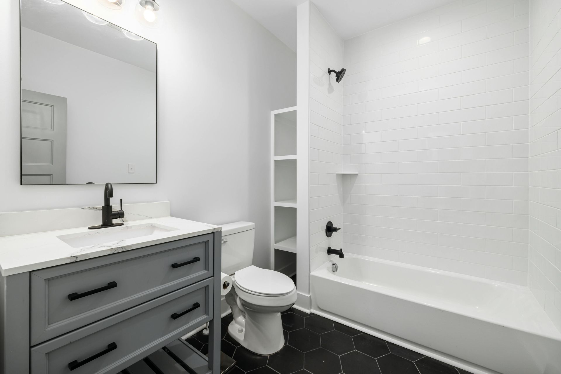 picture of a toilet and bathtub