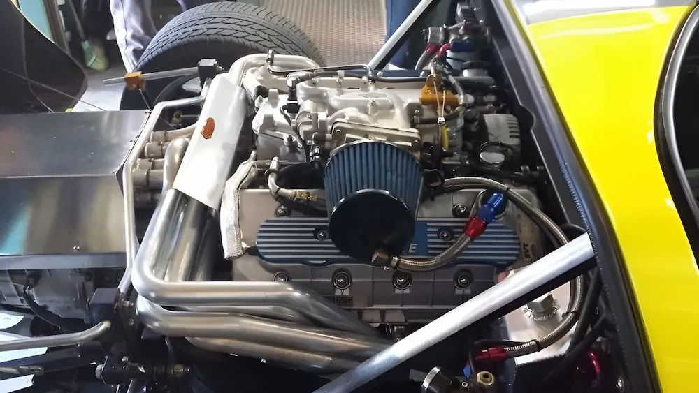 Engine Of A Yellow Car — Figtree Brake and Clutch in Balgownie, NSW