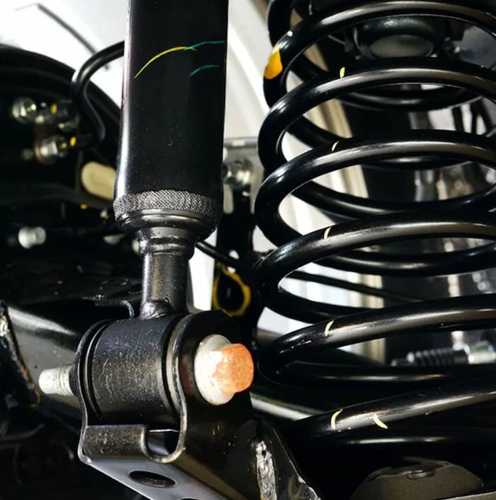 A Car Shock Absorber And Springs — Figtree Brake and Clutch in Figtree, NSW