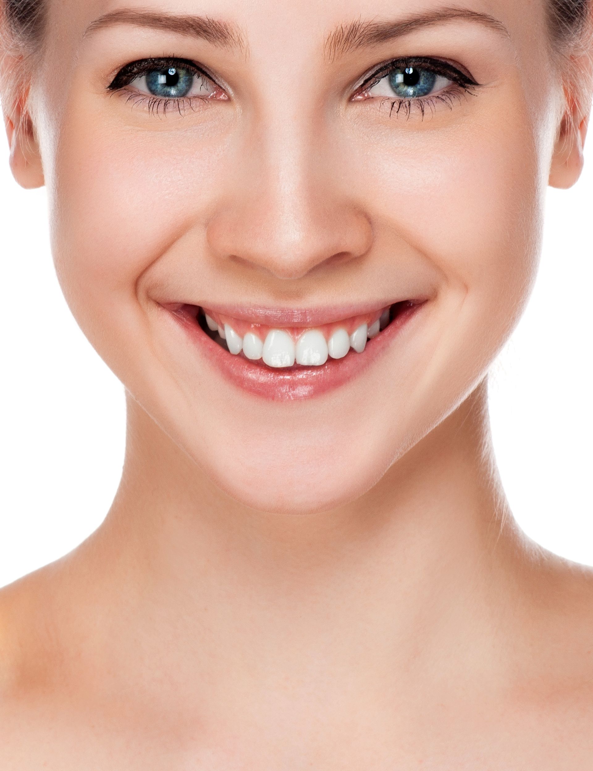 Close-up of a woman with blue eyes smiling widely, showing white teeth. She has fair skin and appears to be looking directly at the viewer.