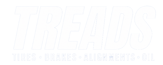 White logo with “FREEDS” and faint slogan “Tires Brakes Alignments Mufflers Oil”