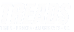 Faint white logo reading “TREADS” with the tagline “THINK • BRAKE • SHIFT • EVERY HILL” on a white background