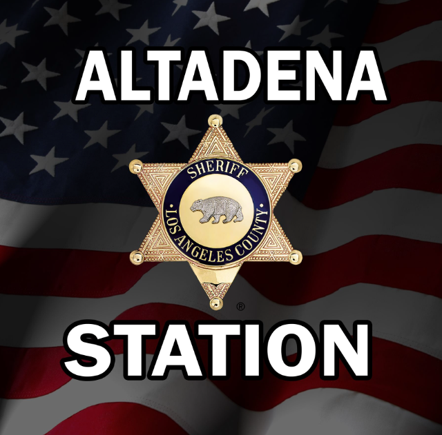 An altadena station sign with an american flag in the background