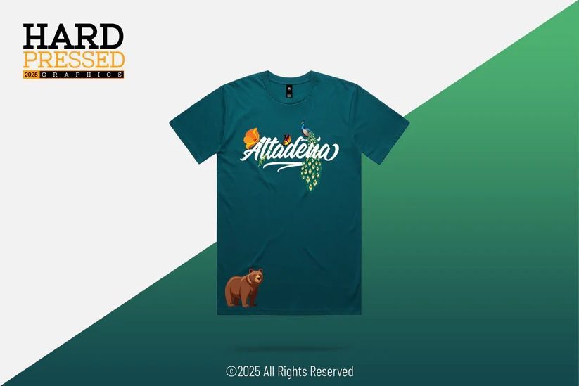 A dark teal t-shirt featuring the word 