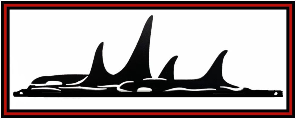 Black abstract silhouette resembling a skyline or flames inside a red-bordered white rectangle
