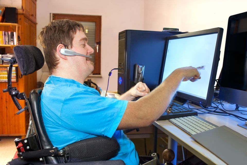 a disabled person on the internet call on a computer