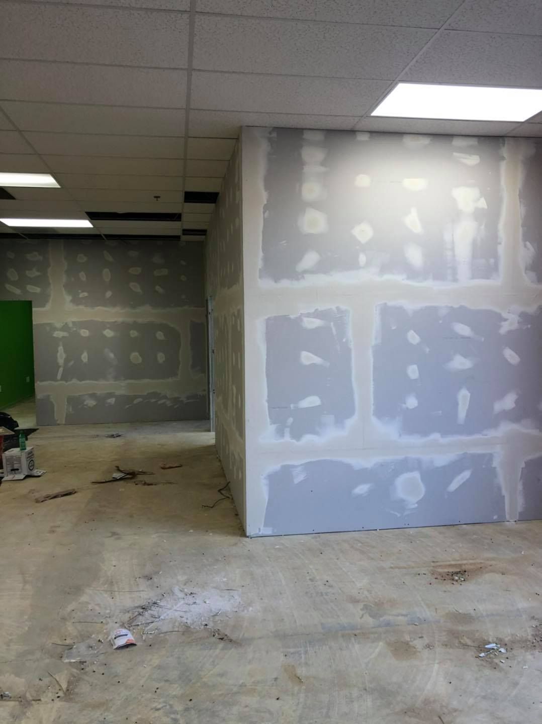 A room with a lot of drywall on the walls