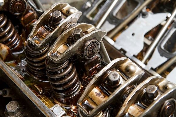 A close up of the inside of a car engine. | Lex Brodies 