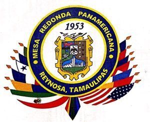 Logo of Mesa Redonda Panamericana, Reynosa, Tamaulipas, with a central emblem surrounded by flags.