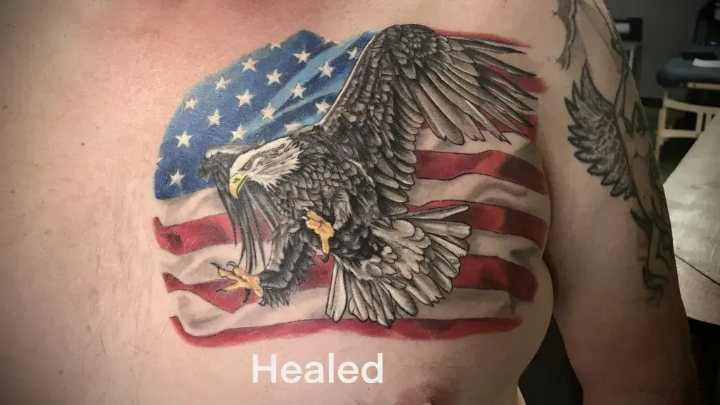 American flag and bald eagle tattoo on chest.