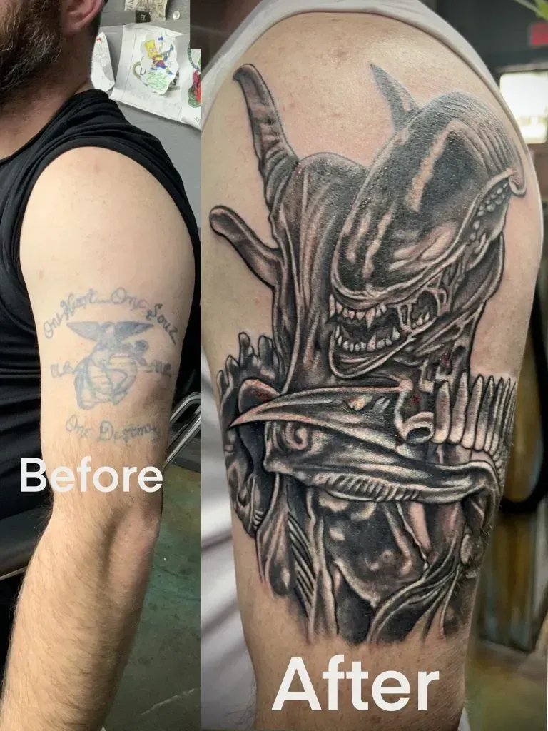 Tattoo cover-up: Before, faded black arm tattoo; After, detailed black and gray Alien face and chest tattoo on shoulder.