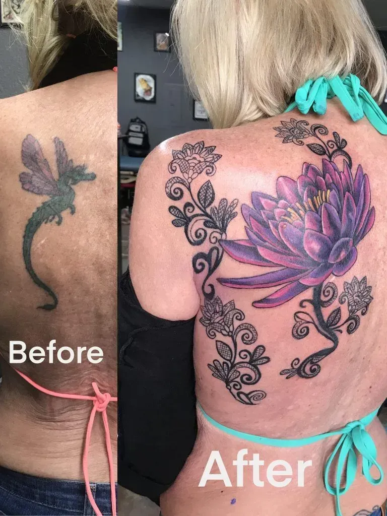 Before and after tattoo cover-up: dragonfly to purple lotus and floral design on woman's back.