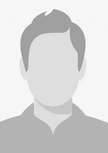 Silhouette of a person with short hair, wearing a collared shirt. Grey tones.