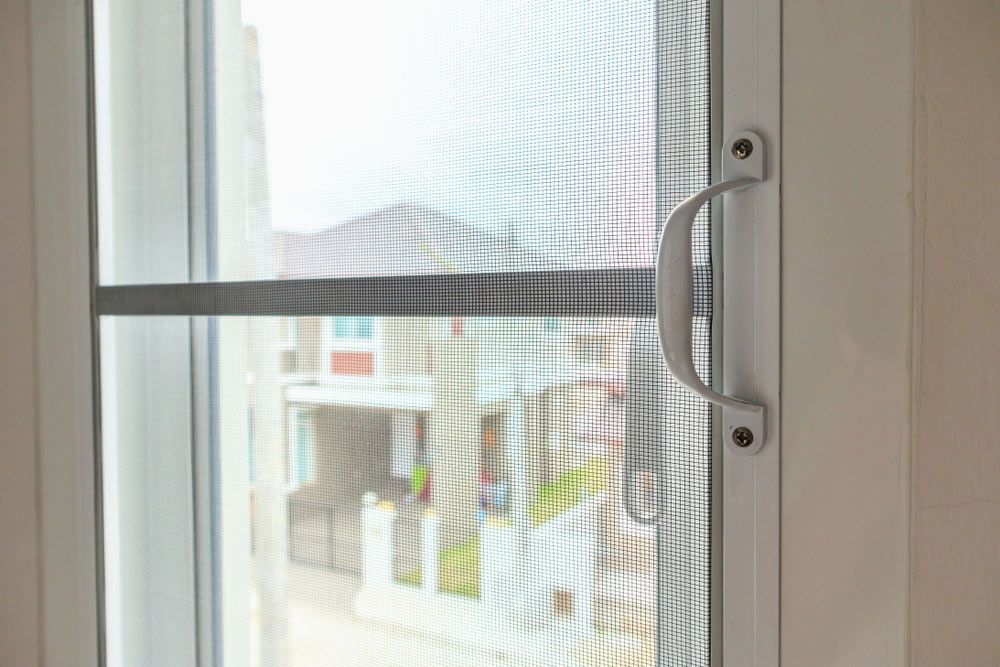 A Window With A Flyscreen On It — Smith Aluminium In Toronto, NSW