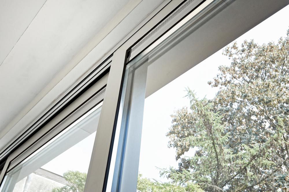A Close Up Of A Sliding Glass Door — Smith Aluminium In Dungog, NSW