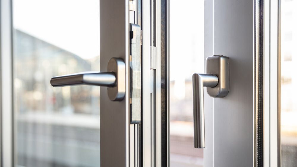 A Close Up Of A Door With A Handle On It — Smith Aluminium In Toronto, NSW