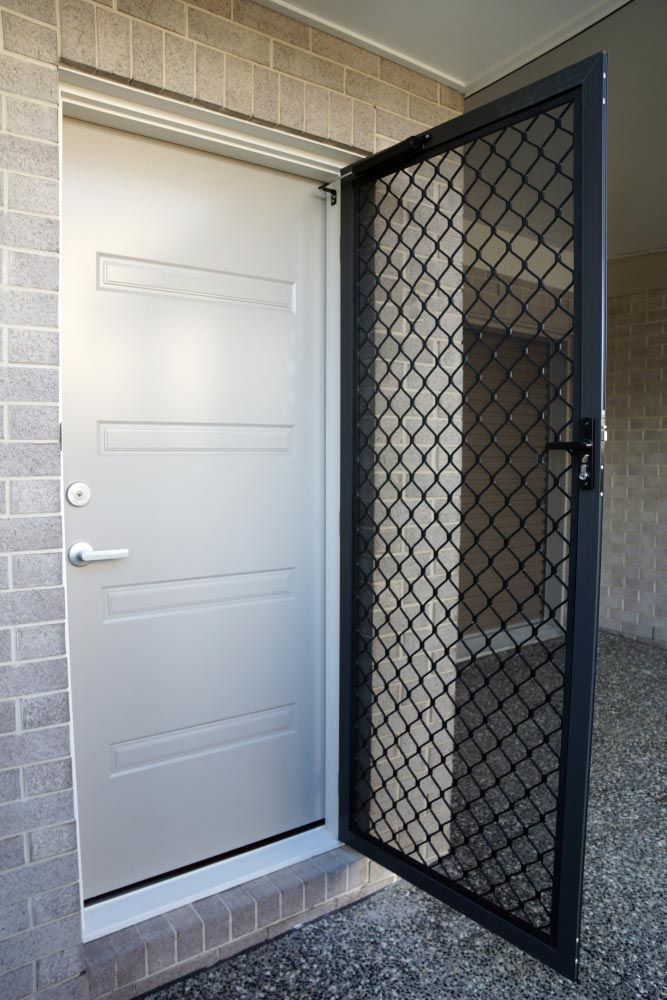 A White Door With A Black Screen — Smith Aluminium In Rutherford, NSW