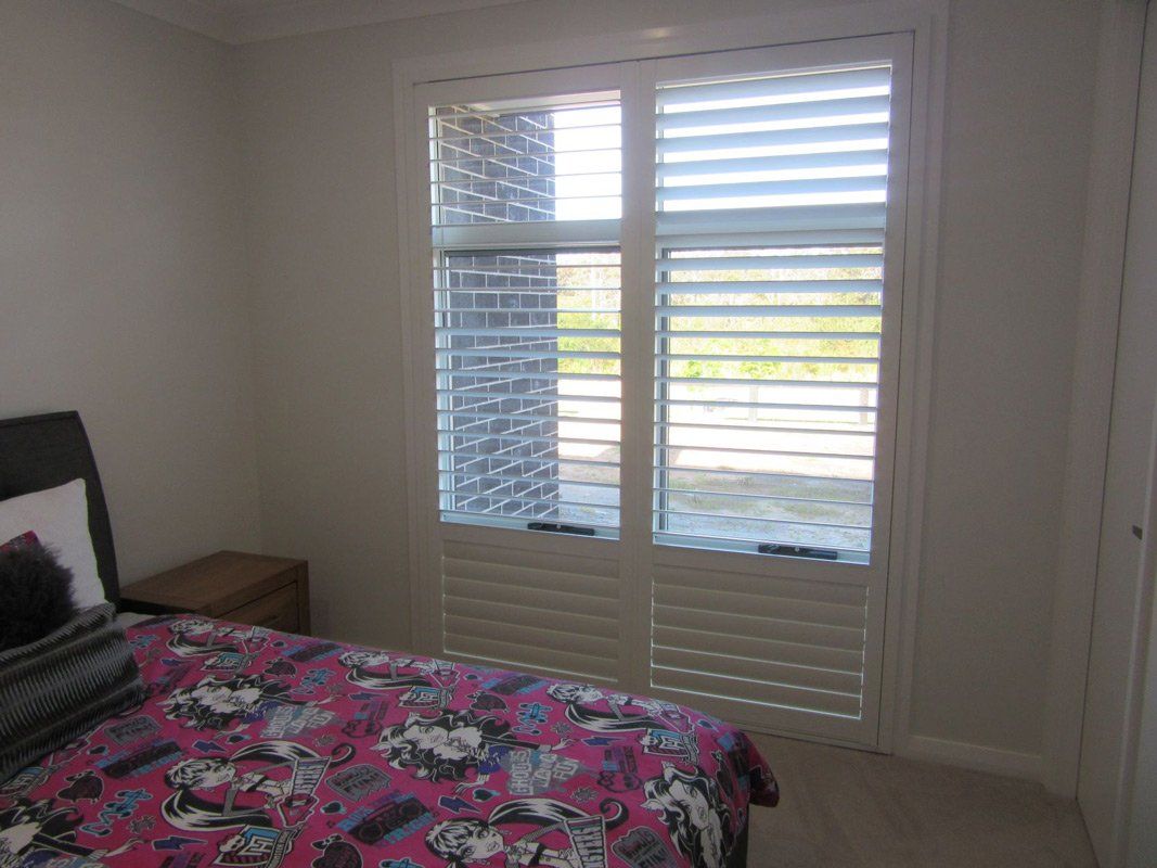 Bedroom Area With Plantation Shutters — Smith Aluminium In Medowie, NSW