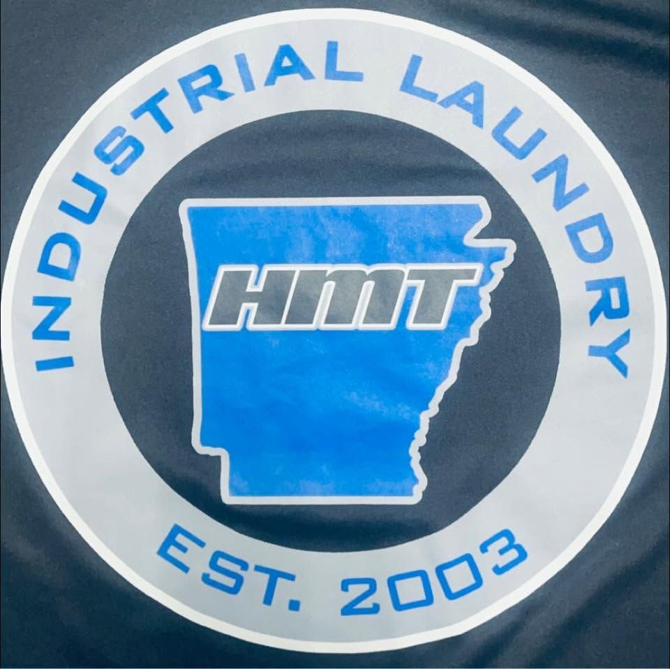 Industrial Laundry HMT logo in blue and white, with Mississippi outline and