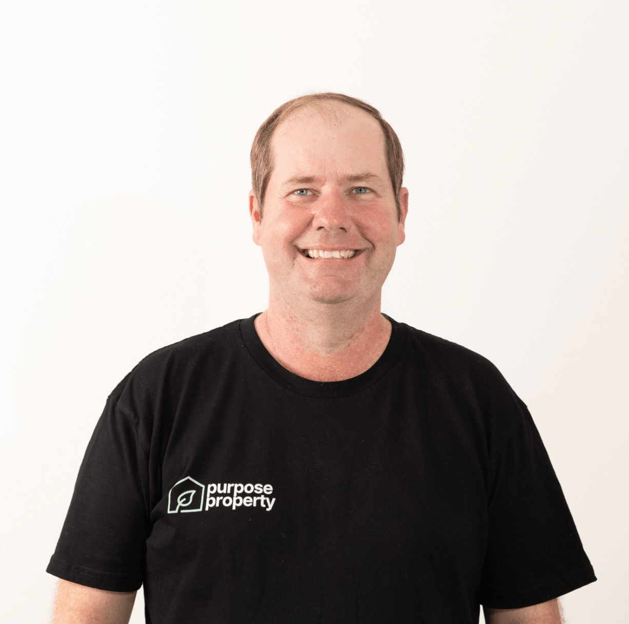 Man in black t-shirt with