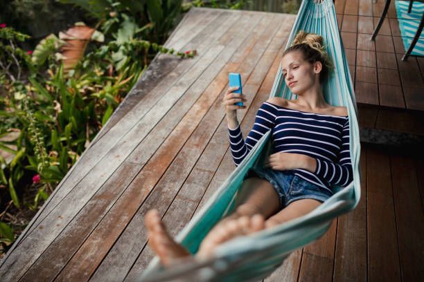 A Girl Using Cellphone — Toowoomba, QLD — Garden City Antennas