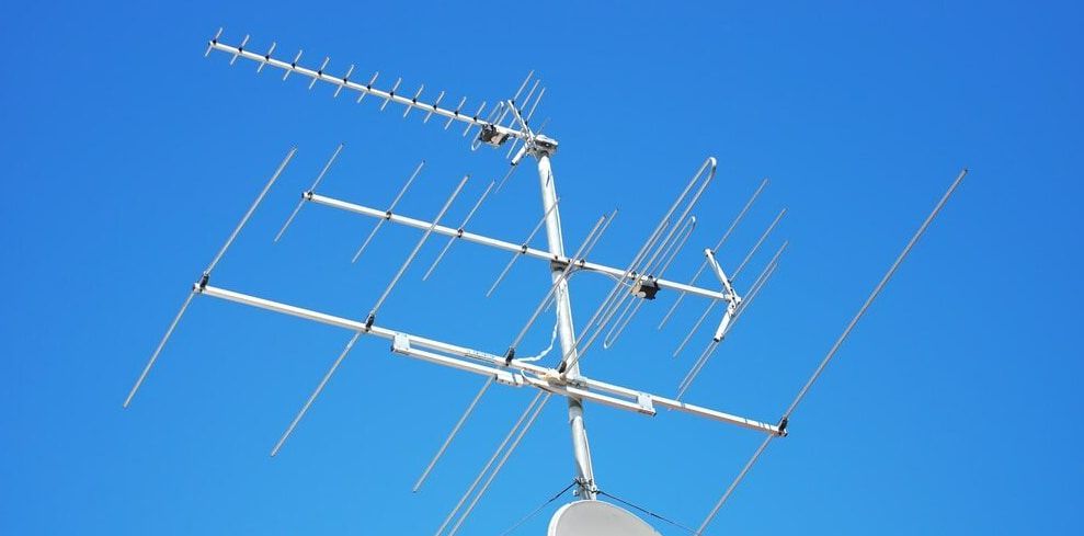 A Large Antenna Is Against A Blue Sky — Outback Internet & Comms In Ciccone, NT