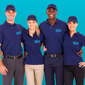 Four people in blue uniforms and caps, smiling, with a logo on their shirts, standing against a teal background.