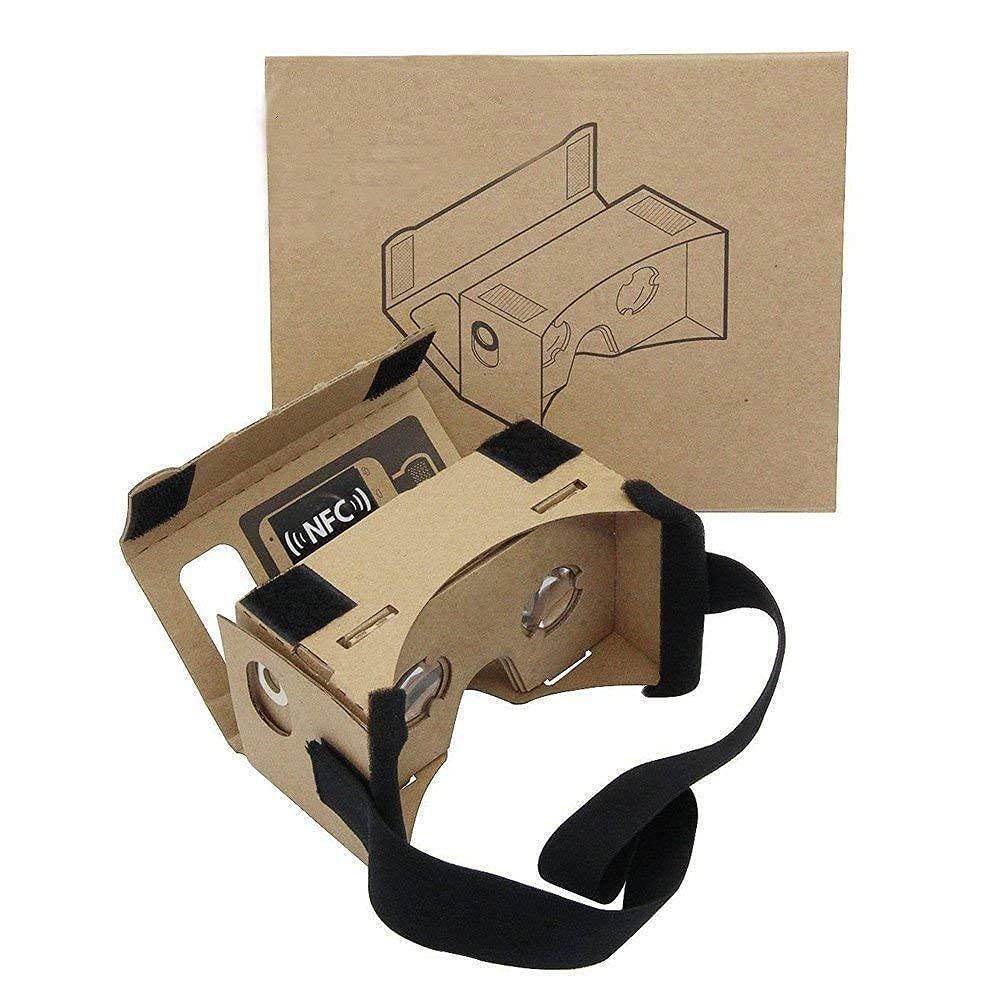 Cardboard VR headset with black strap, alongside its box with assembly diagram.