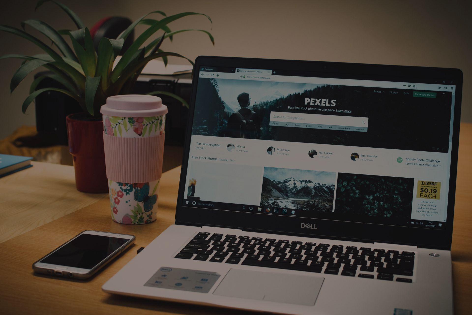 a laptop computer is open to a website called pixels