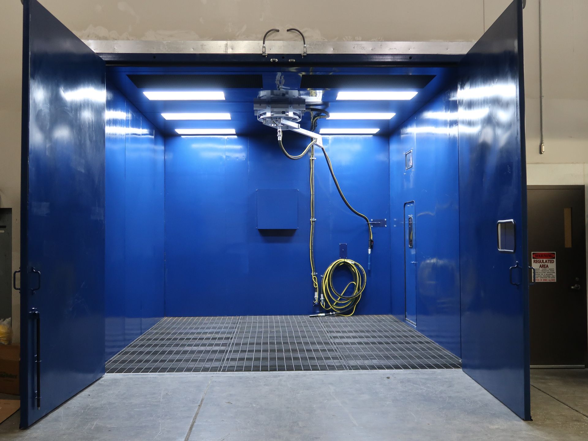 360 degree hose hangar inside VES blast enclosure