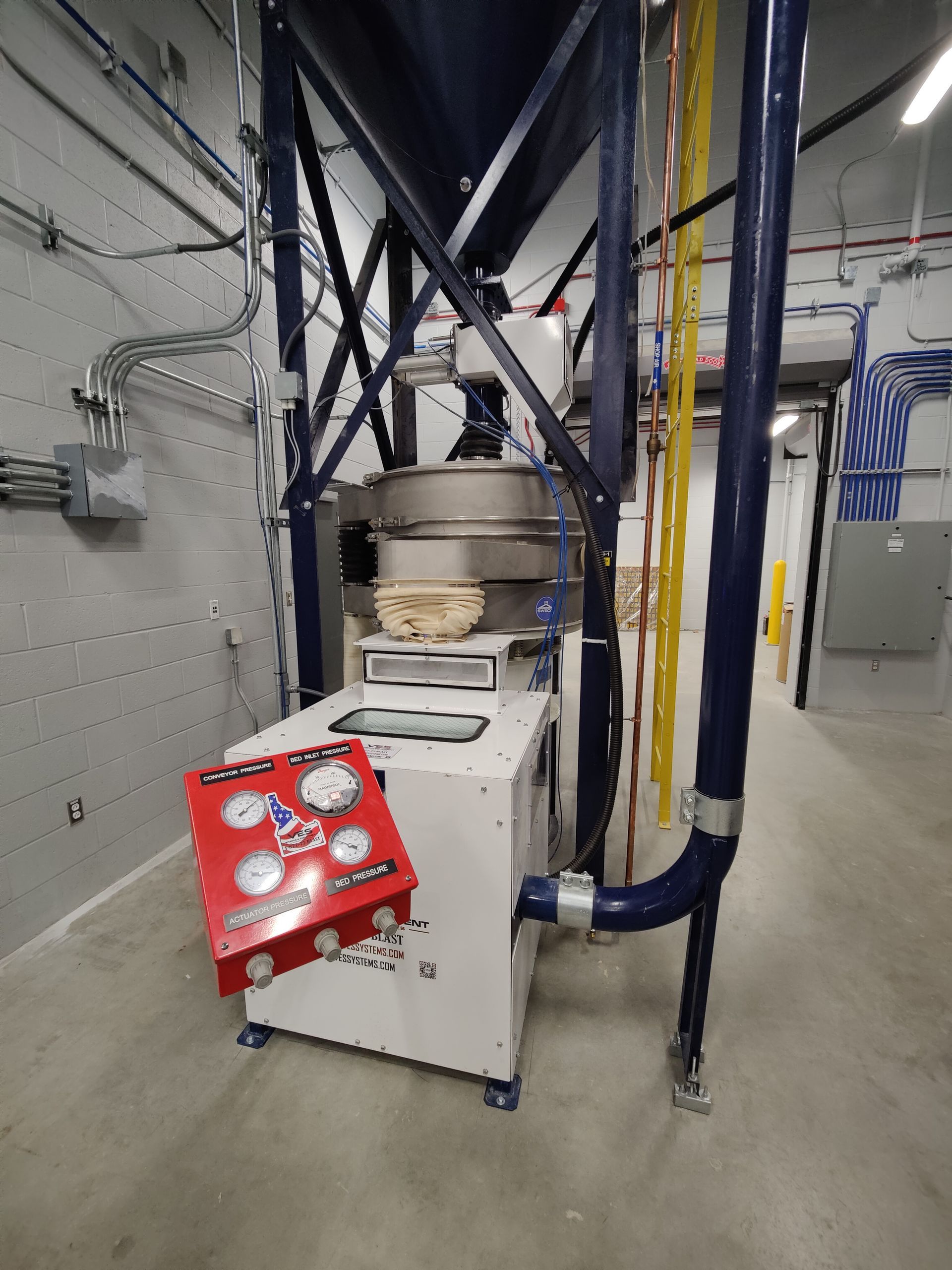 Industrial abrasive recovery equipment.
