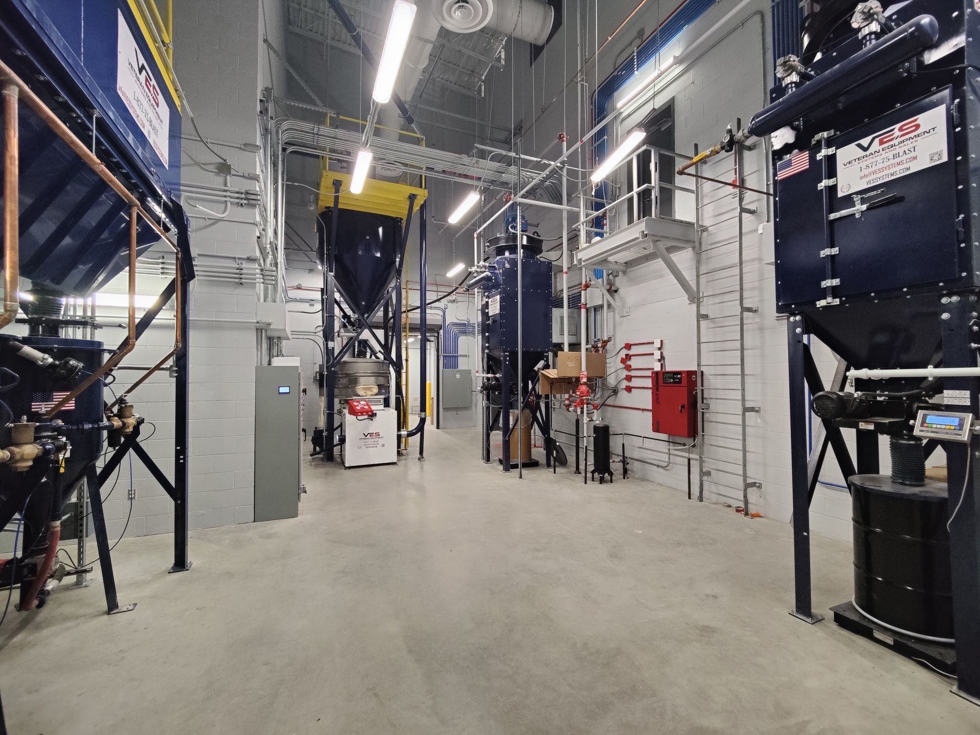 Multiple pieces of VES industrial equipment installed inside a facility