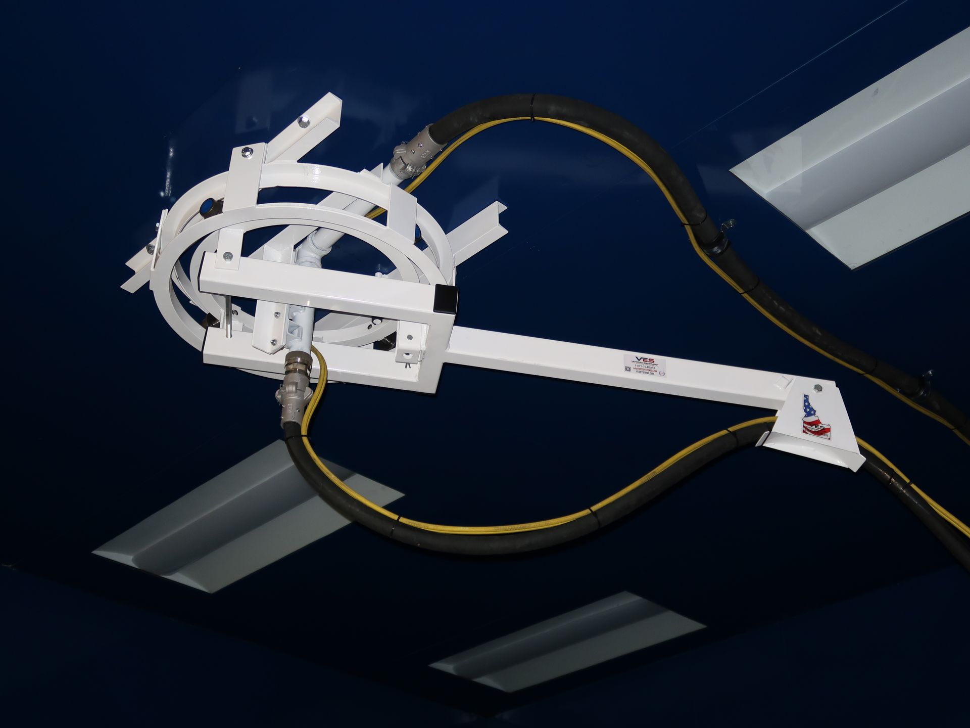 VES blast hose hanger system mounted overhead to support safer abrasive blasting workflows.