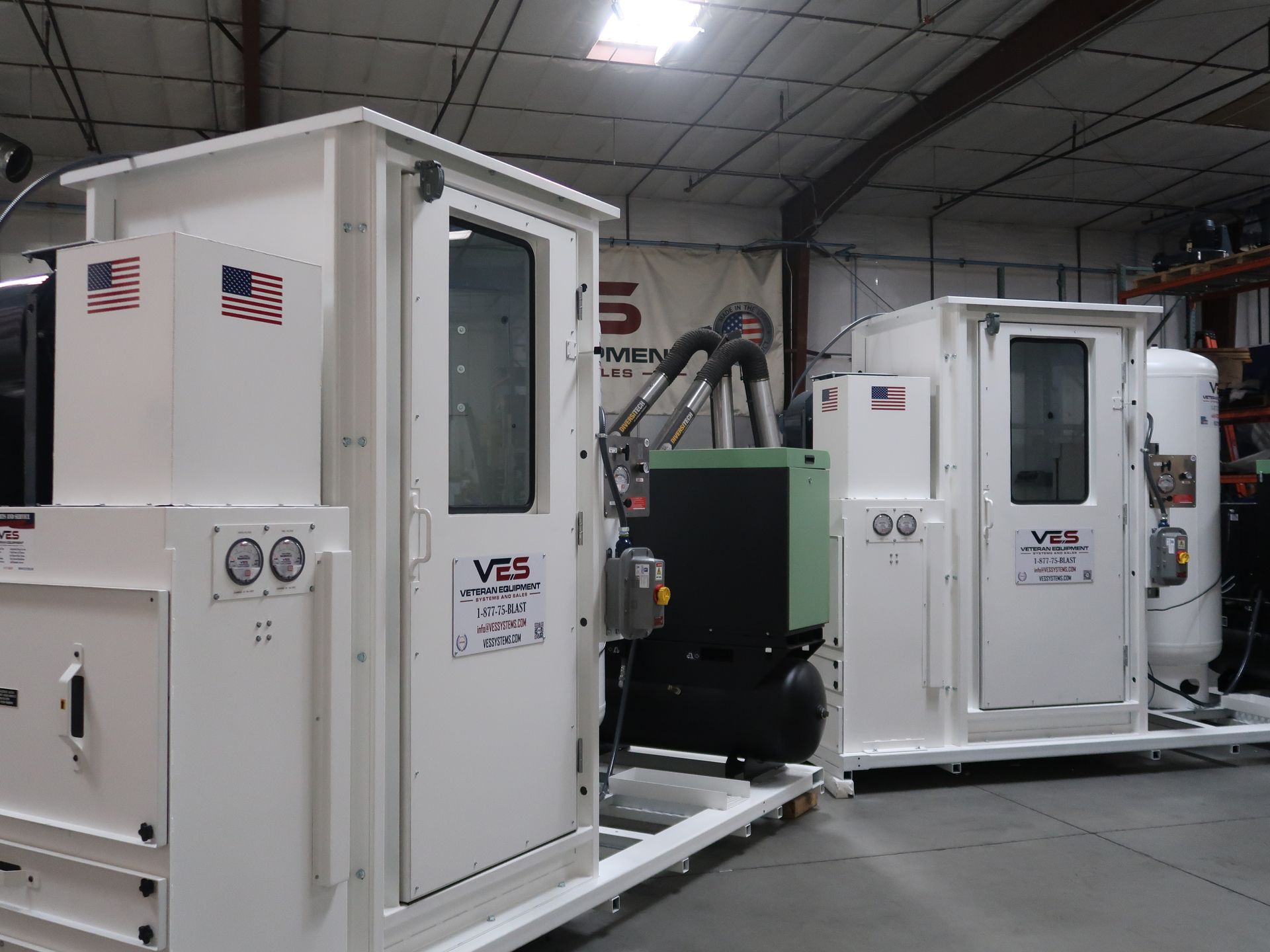 Two VES personnel air shower systems sitting inside facility.