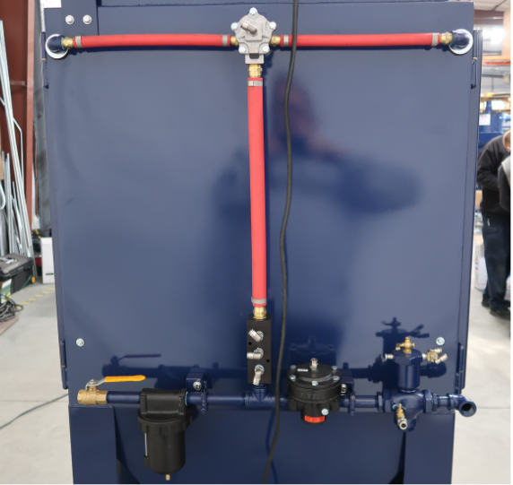 Rear view of VES Viper Series blast cabinet showing pneumatic lines, regulator, filters, and control components