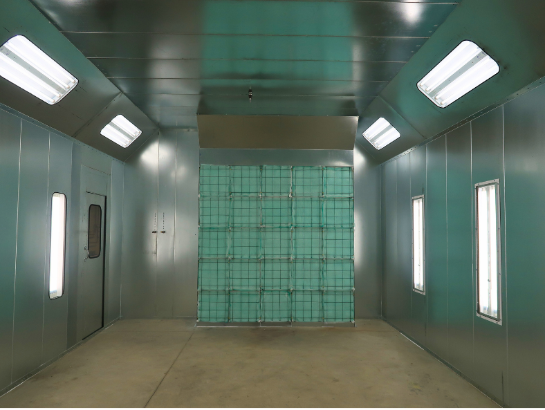 Interior of a custom air shower with lighting, ventilation, and filtered back wall.