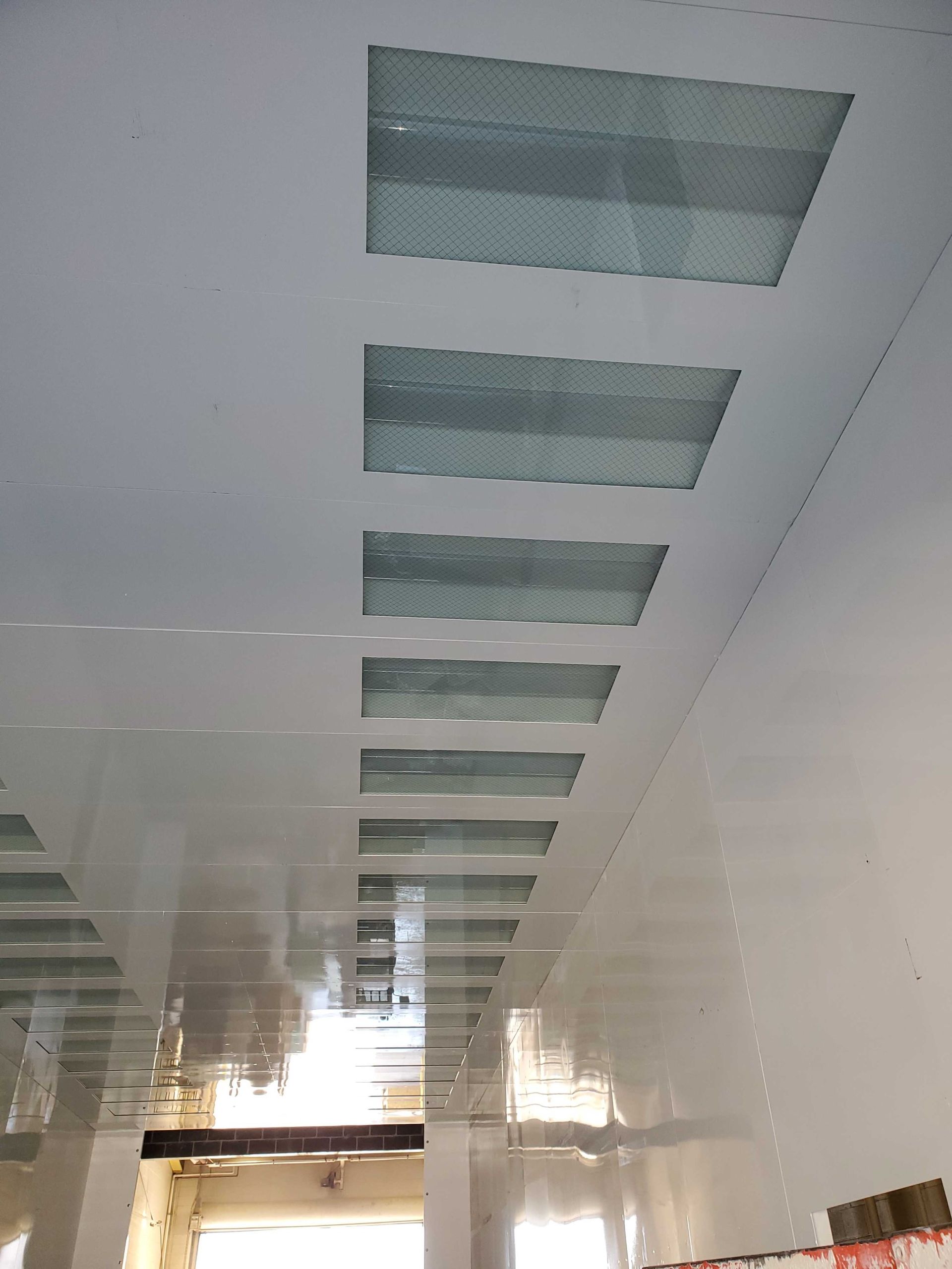 Interior ceiling of large white VES blast enclosure.