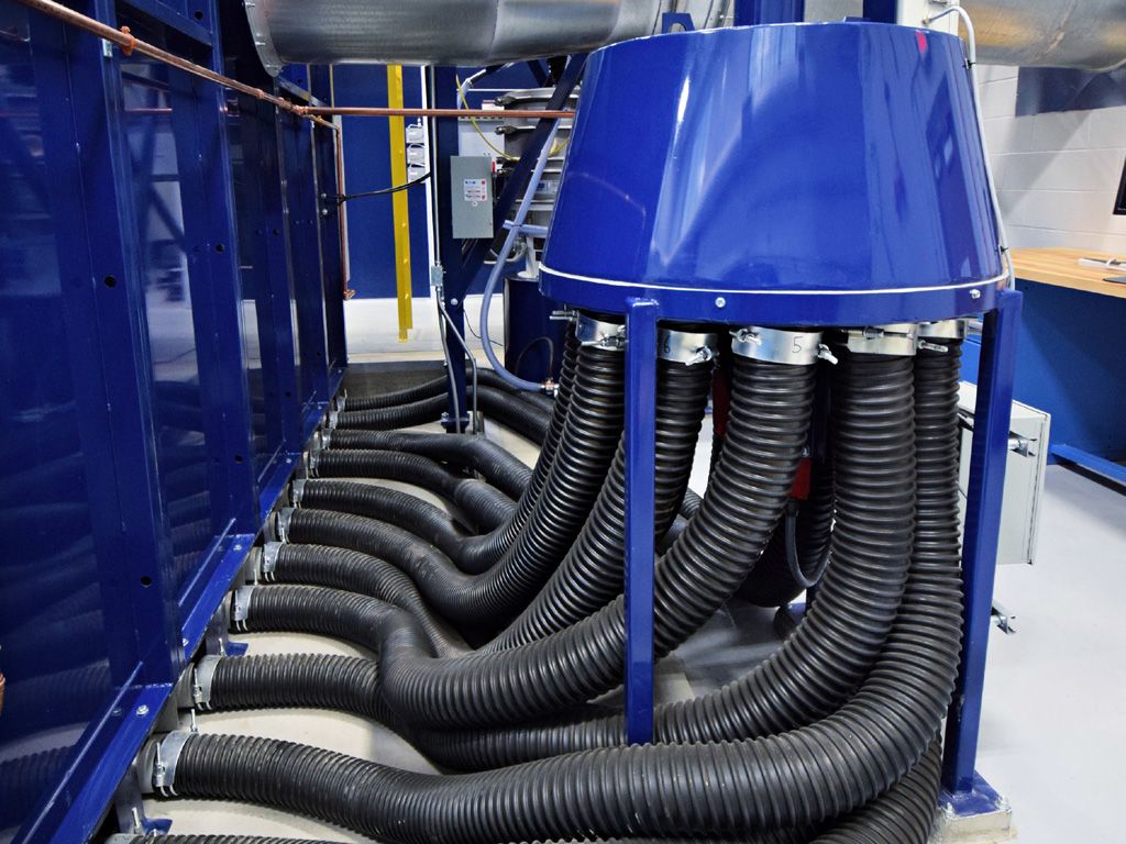 VES Pneumatic Media Recovery System with multiple black hoses connected to a central hub.