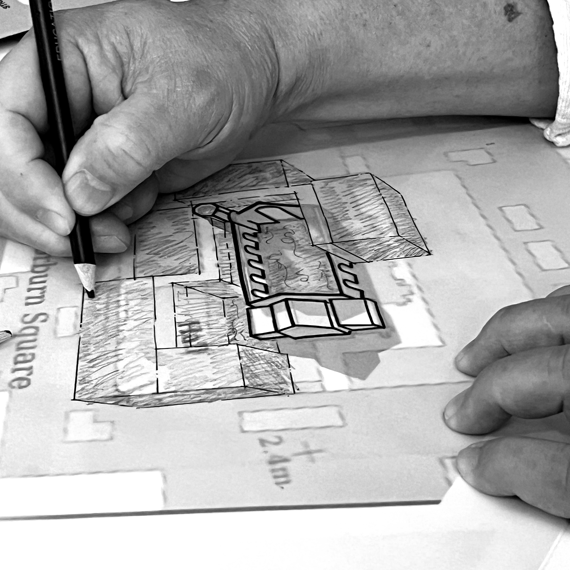 Hands sketching a design proposal