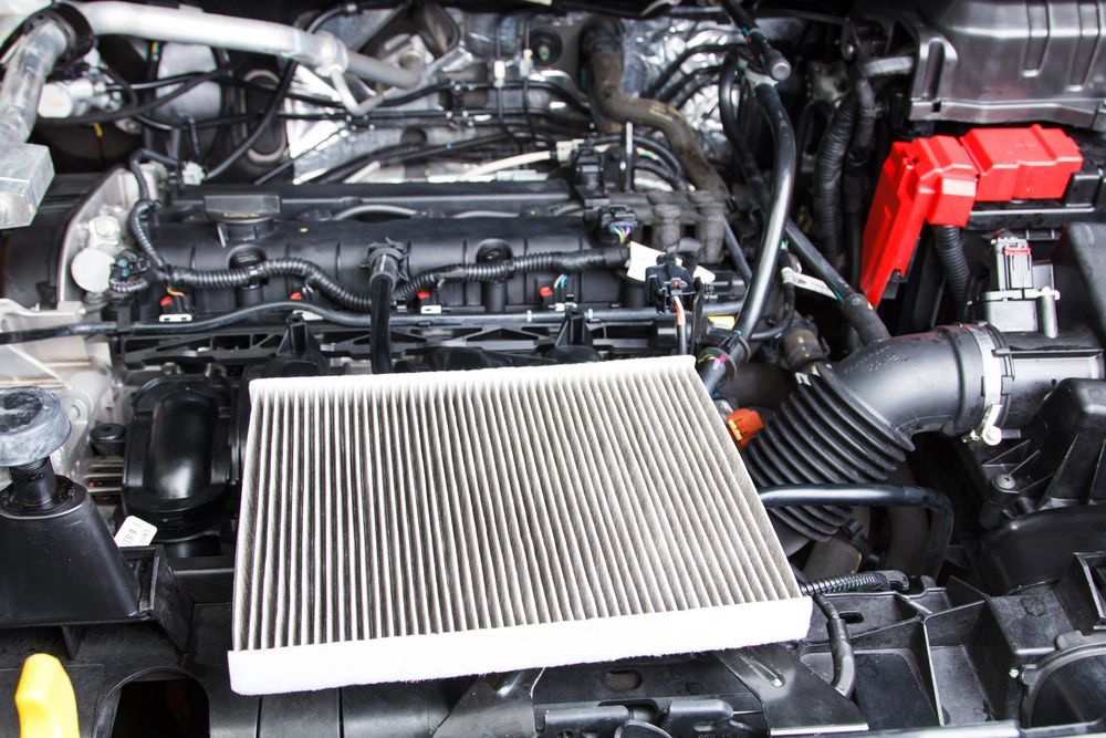 Engine Bay With a Used Air Filter in Front of the Engine — Mareeba Motors In Mareeba, QLD