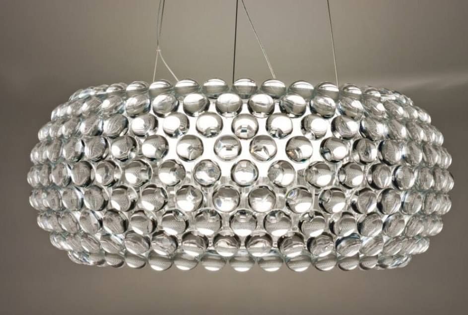 Silver crystal pendant chandelier with circular glass prisms hanging from the ceiling