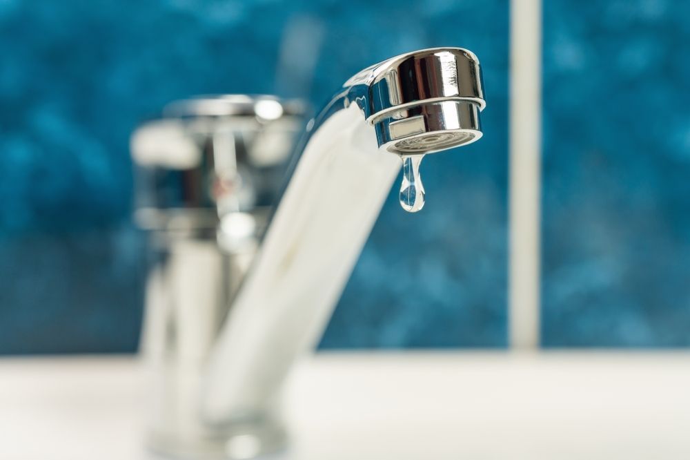 Leaking Tap With Dripping Water — Waves Plumbing in Central Coast, NSW